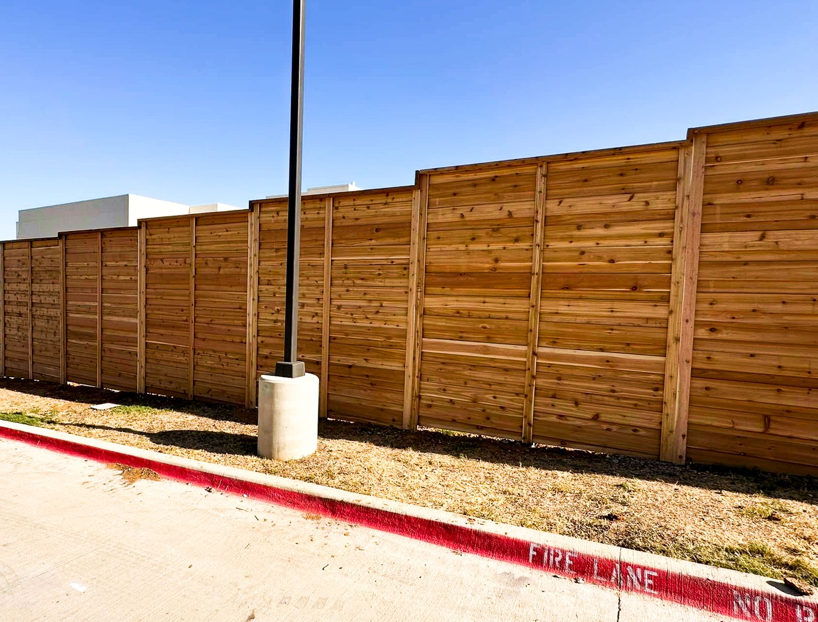 Galvanized chain link fence installed at a DFW industrial site